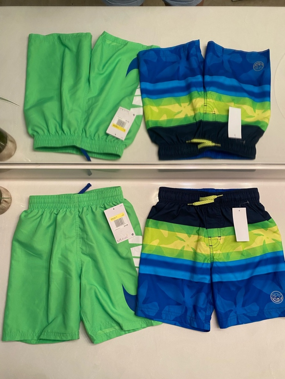 Nike swim trunks size small and zeroxposur size 5/6 new